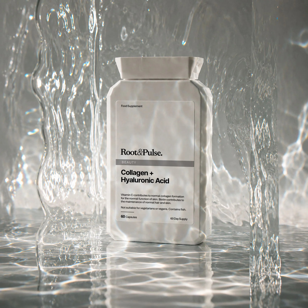 A white bottle of Root & Pulse Collagen + Hyaluronic Acid dietary supplement, set against a highly stylized background of clear water droplets and ripples on a reflective gray surface.