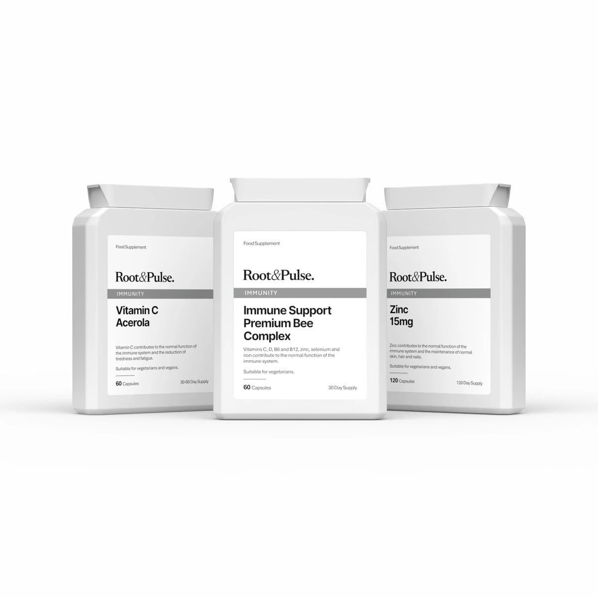 Three white supplement boxes from Root & Pulse on a clean white background, including Vitamin C Acelera, Immune Support Premium Bee Complex, and Zinc 15mg.