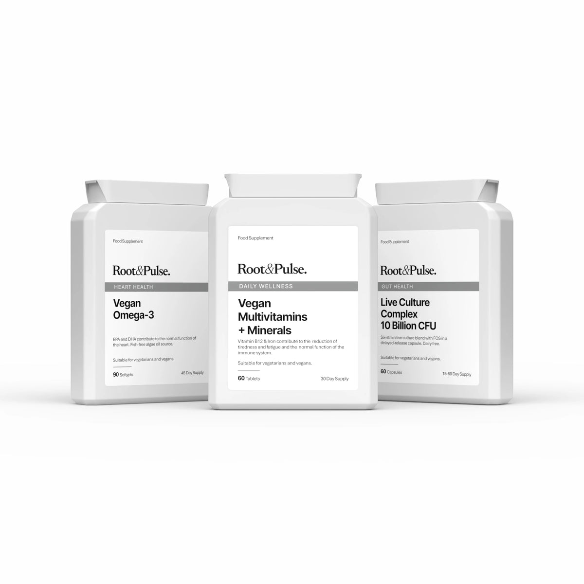 Three white supplement containers from Root & Pulse on a clean white background. The center container is labeled 'Vegan Multivitamins + Minerals', flanked by 'Vegan Omega-3' on the left and 'Live Culture Complex' on the right.